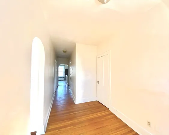a kitchen with a sink cabinets and appliances