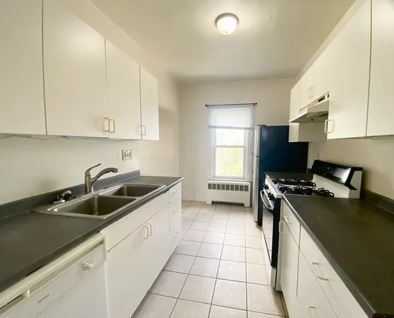 a view of a room with a large window