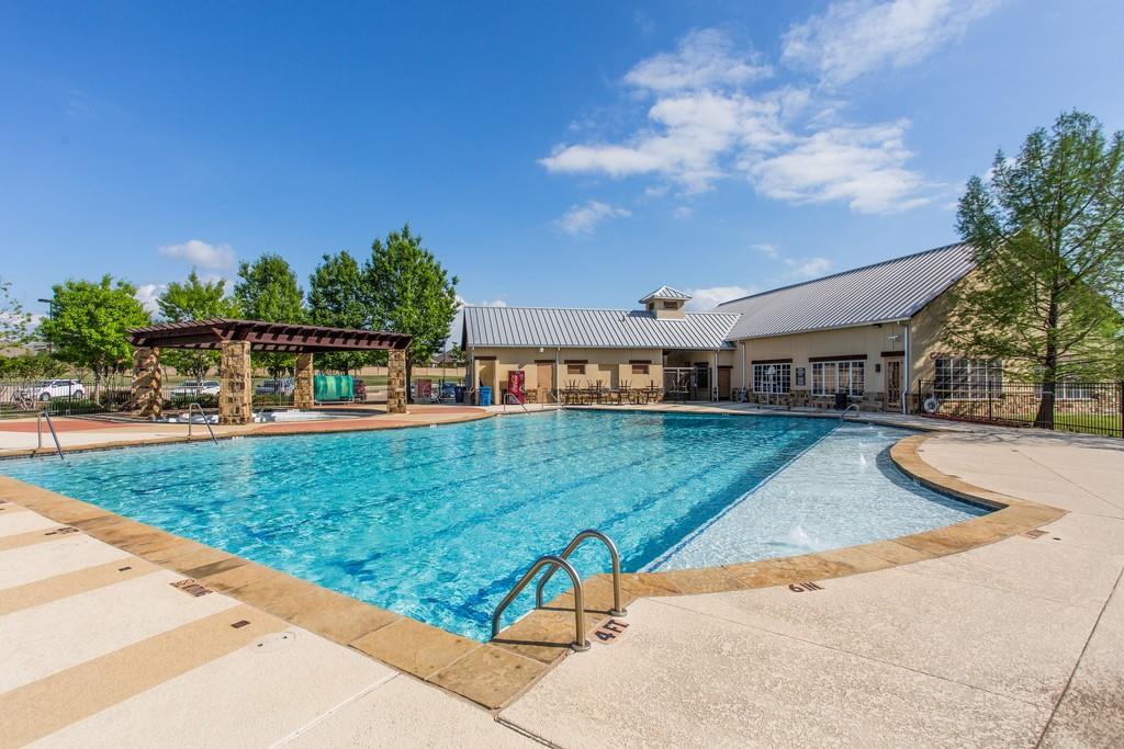 731 Lockridge Road Lantana, TX 76226 - Photo 38 of 38 Lantana offers 2 junior Olympic-size pools in addition to three neighborhood pools located in the community