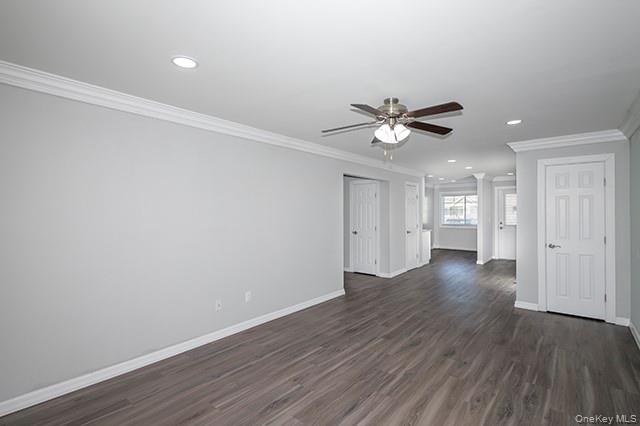 384 Cassa Loop, Unit 384 Holtsville, NY 11742 - Photo 7 of 14 a view of an empty room with wooden floor