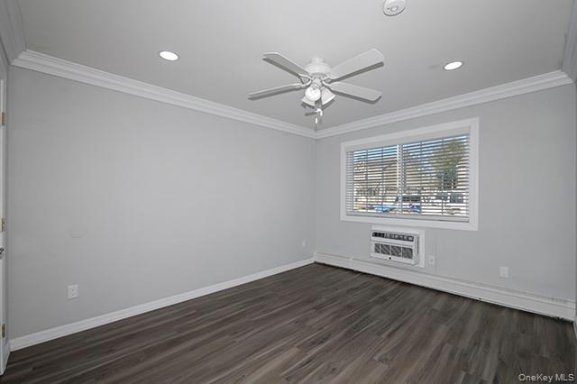 384 Cassa Loop, Unit 384 Holtsville, NY 11742 - Photo 8 of 14 wooden floor in an empty room with a window