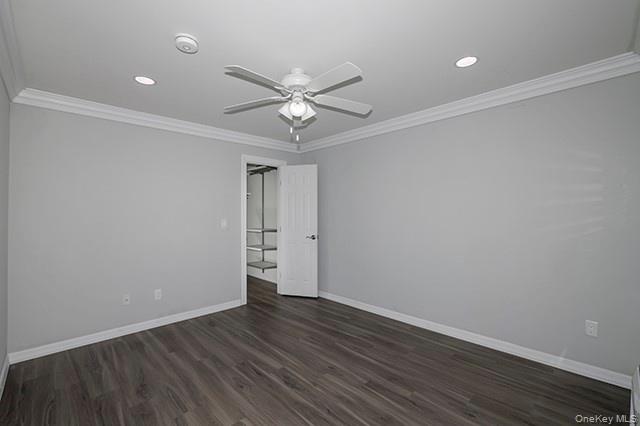 384 Cassa Loop, Unit 384 Holtsville, NY 11742 - Photo 9 of 14 a view of an empty room with wooden floor