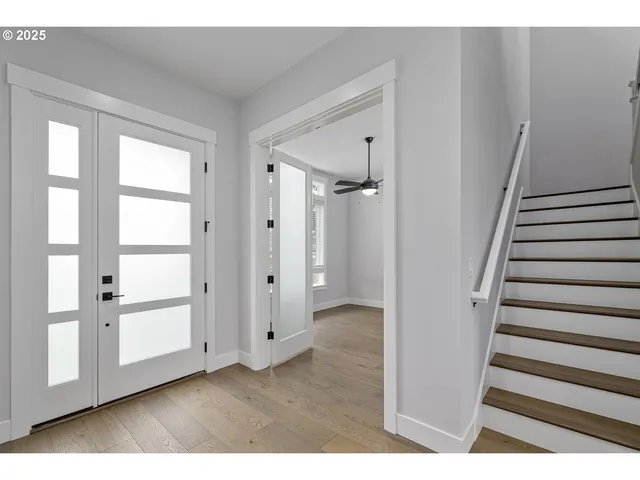 a view of an entryway with staircase