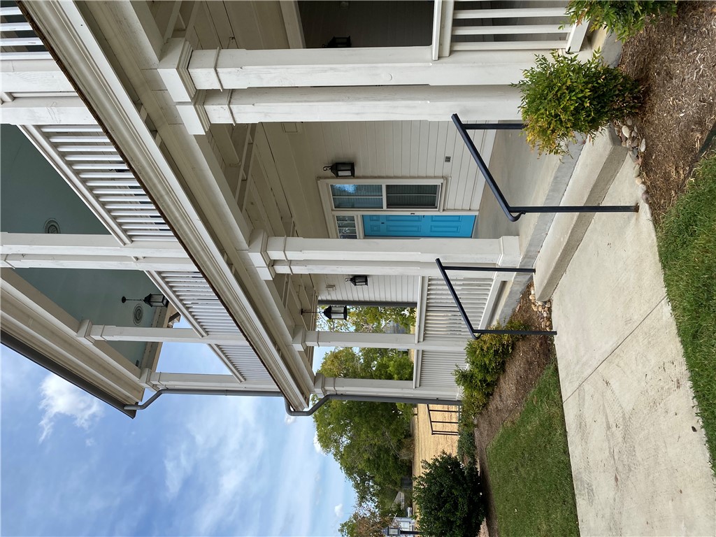 208 West 22nd Street, Unit B Bryan, TX 77803 - Photo 2 of 15 front view of house with a yard