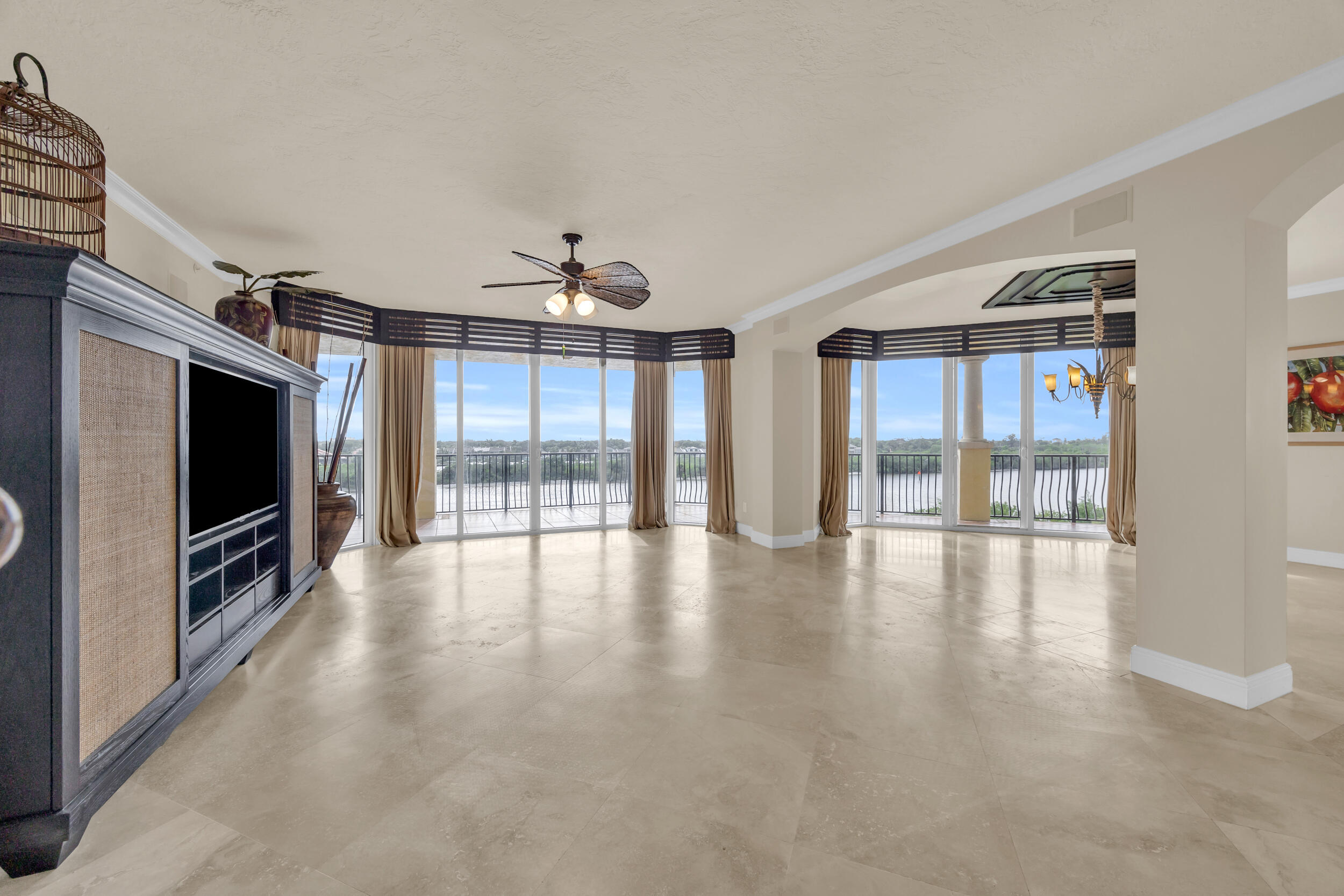 340 South US Highway 1, Unit 408 Jupiter, FL 33477 - Photo 18 of 53 a view of a livingroom with wooden floor and a flat screen tv