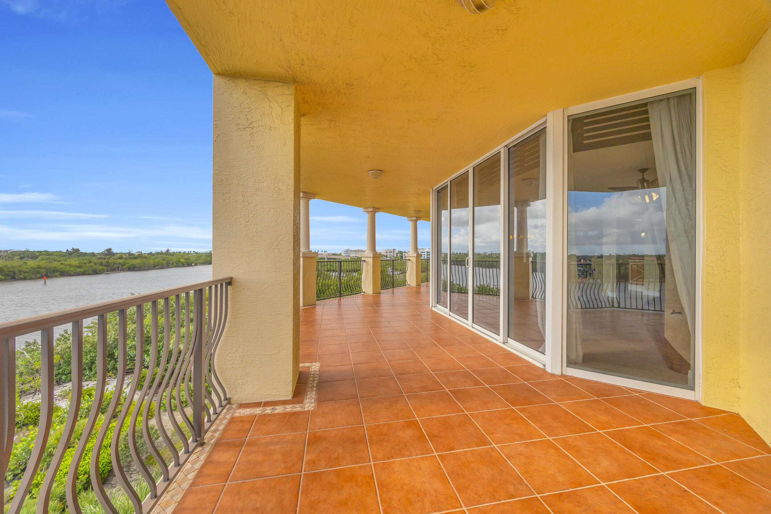 340 South US Highway 1, Unit 408 Jupiter, FL 33477 - Photo 21 of 53 a balcony with view of an outdoor space