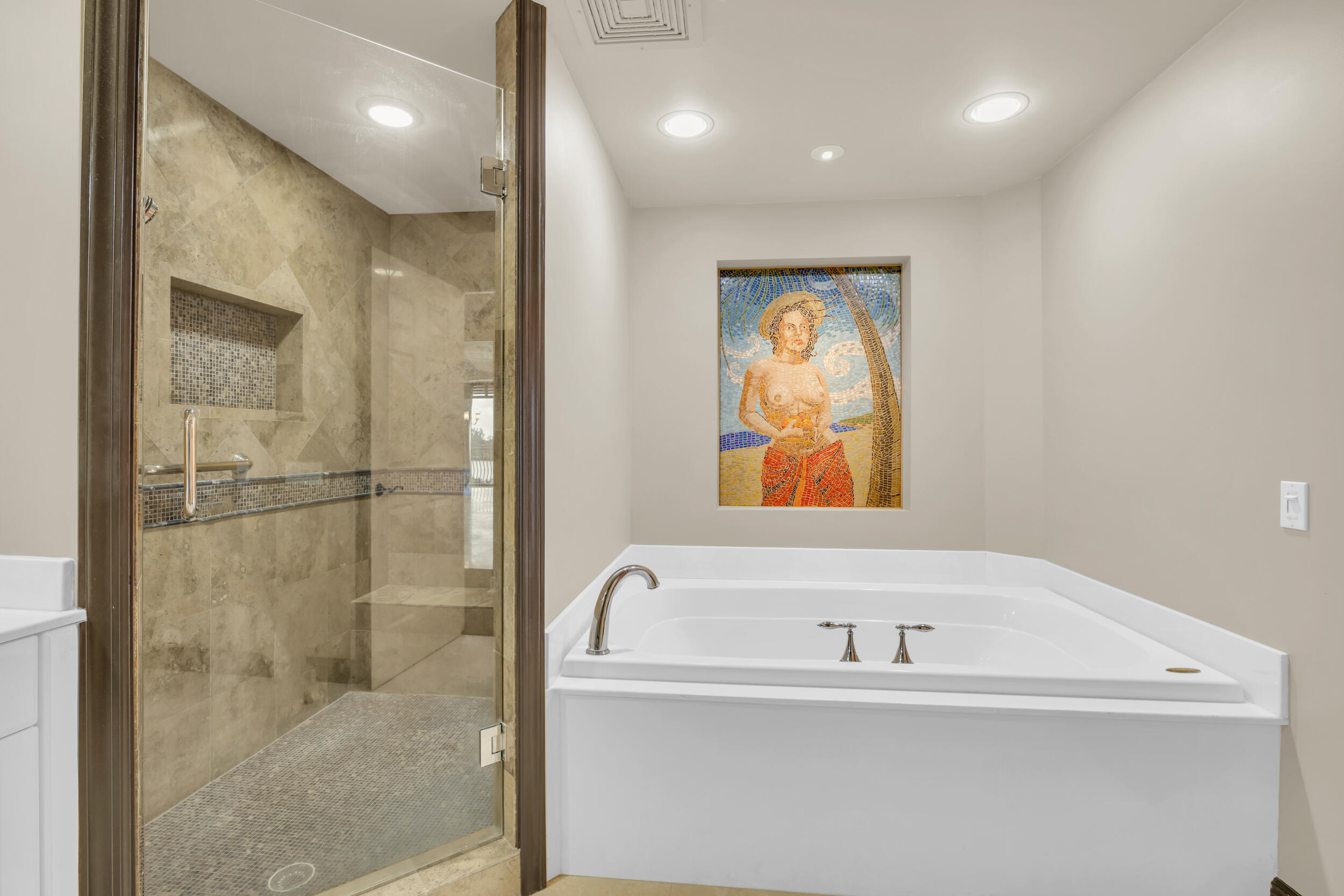 340 South US Highway 1, Unit 408 Jupiter, FL 33477 - Photo 36 of 53 a bathroom with a bathtub and a shower