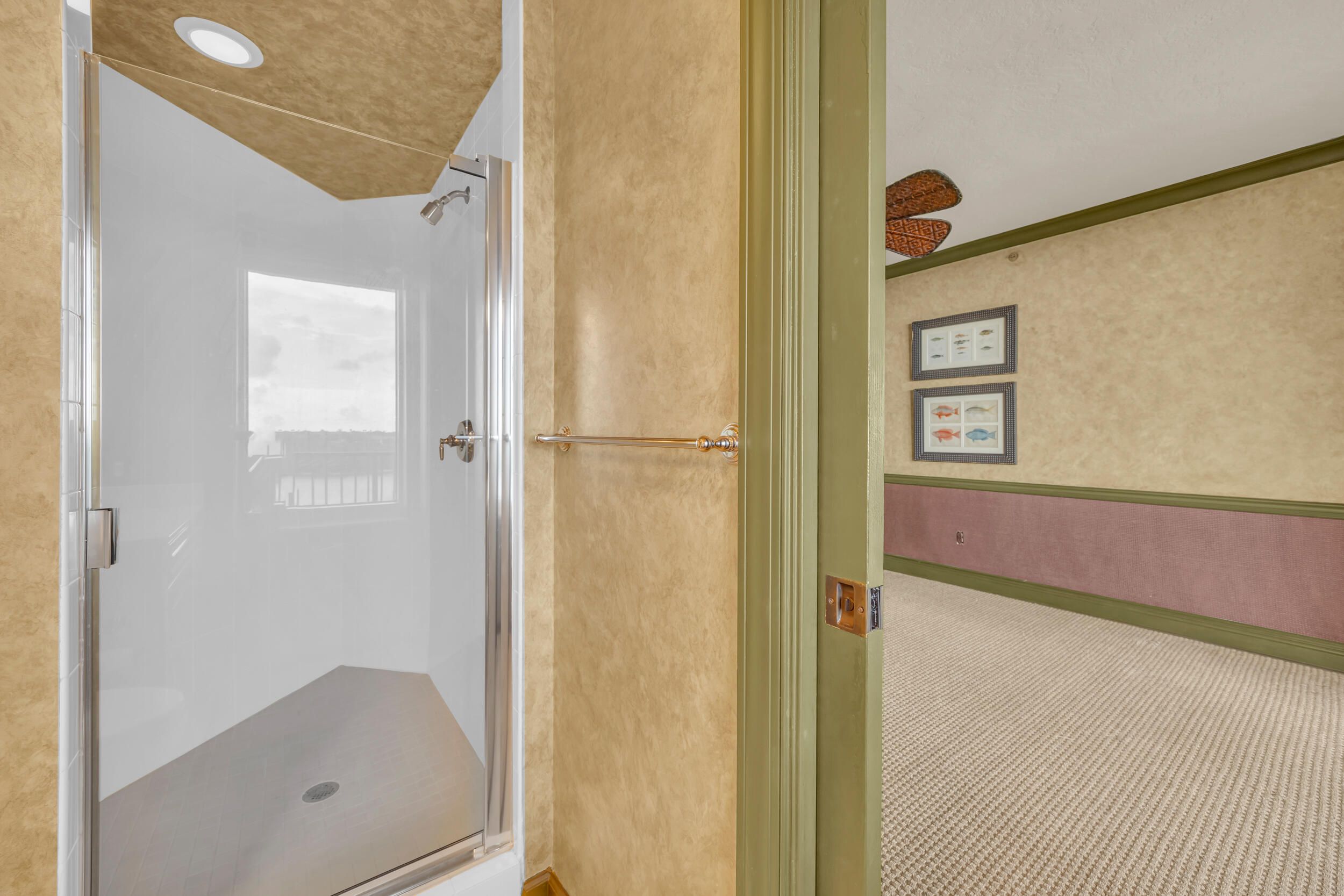 340 South US Highway 1, Unit 408 Jupiter, FL 33477 - Photo 44 of 53 a bathroom with a shower