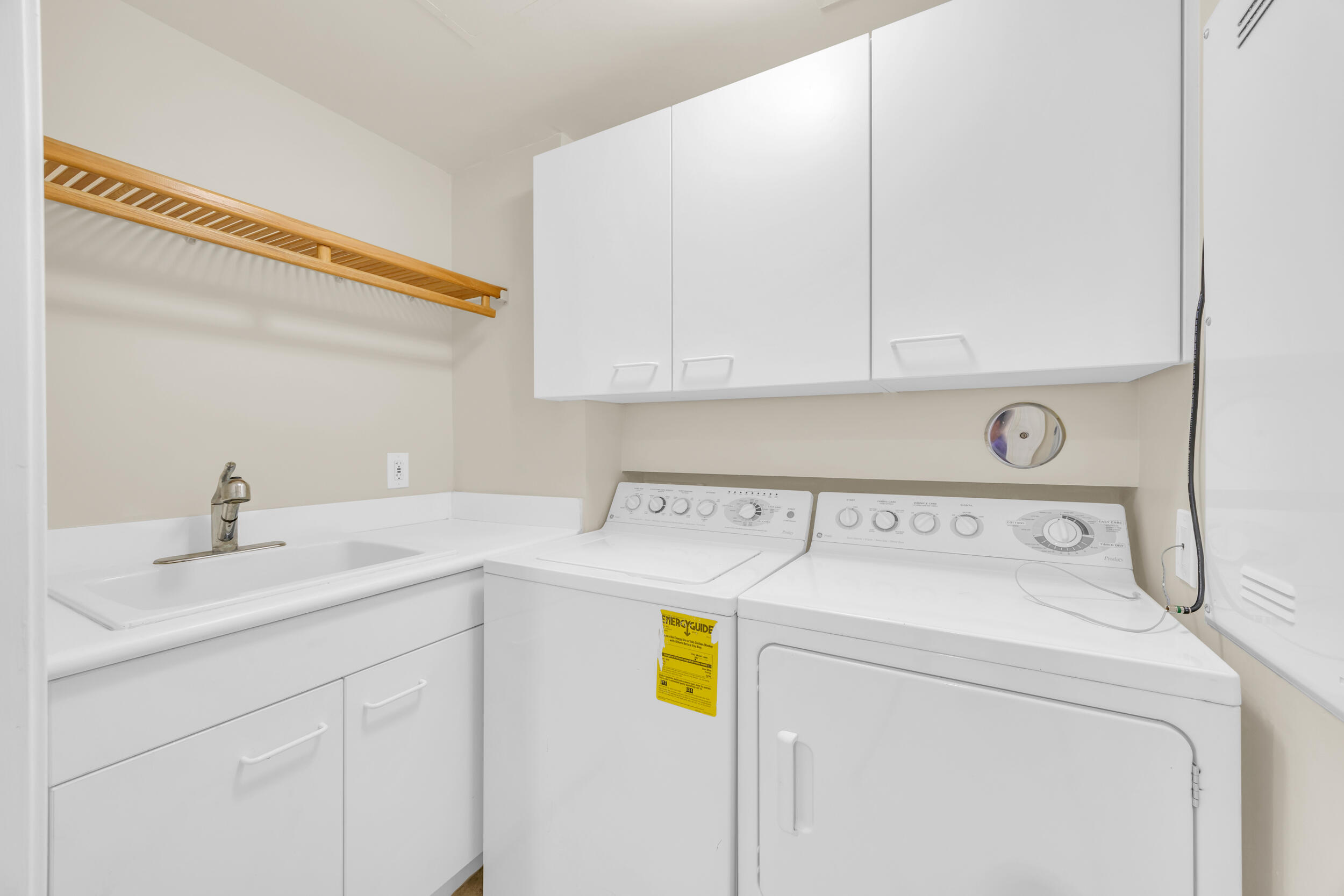 340 South US Highway 1, Unit 408 Jupiter, FL 33477 - Photo 45 of 53 a utility room with dryer and washer