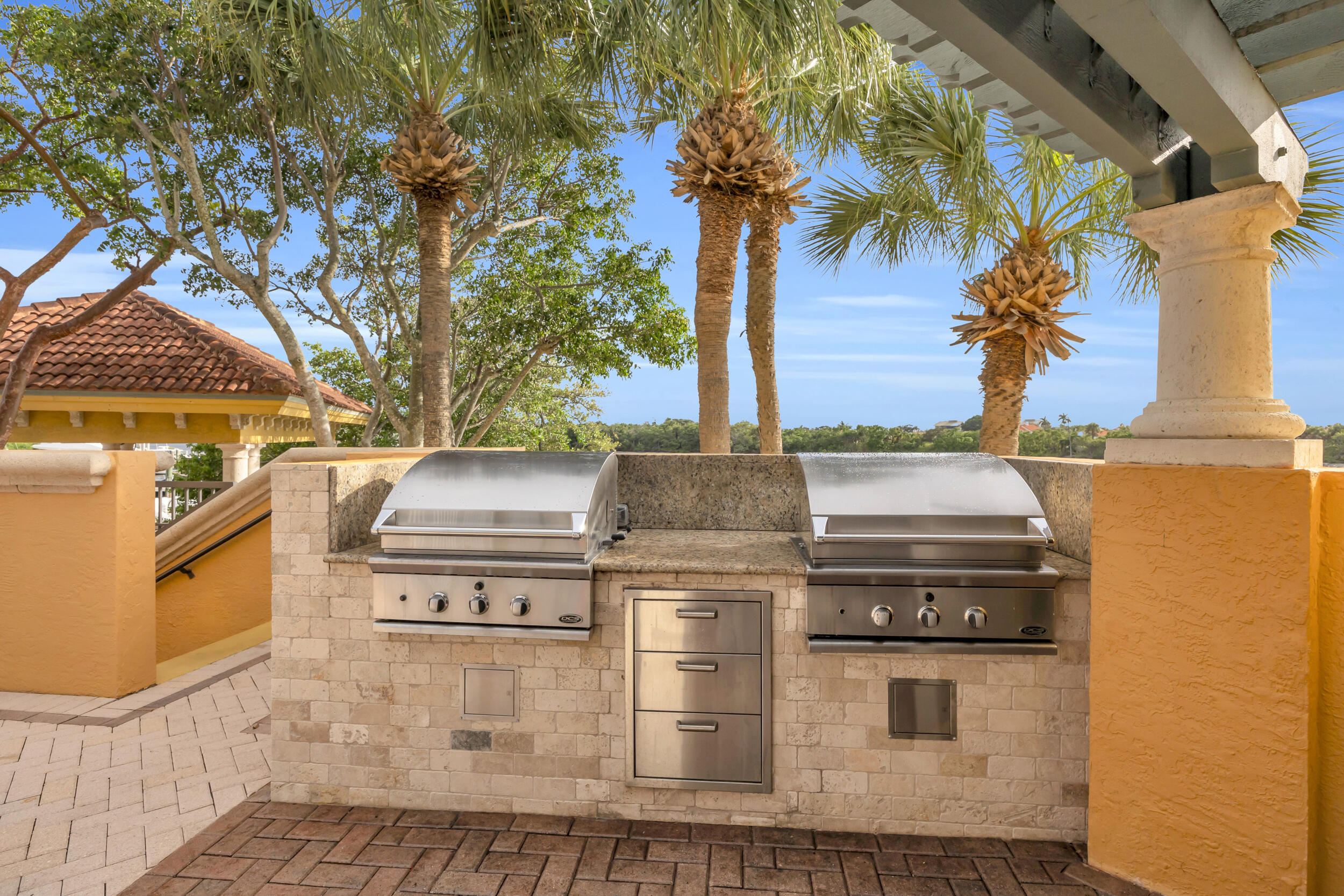 340 South US Highway 1, Unit 408 Jupiter, FL 33477 - Photo 47 of 53 a stove top oven sitting inside of a kitchen