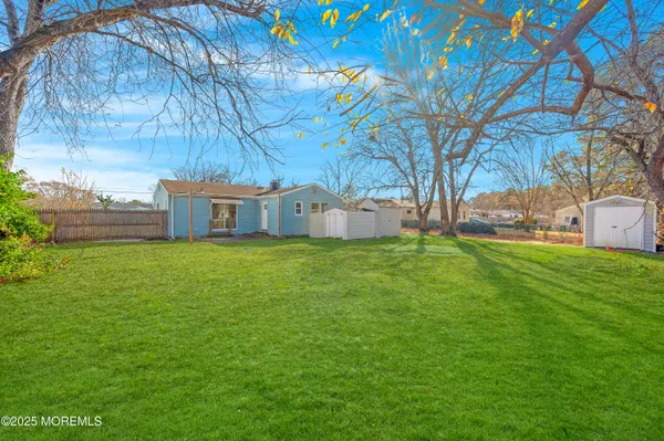 a house view with garden space