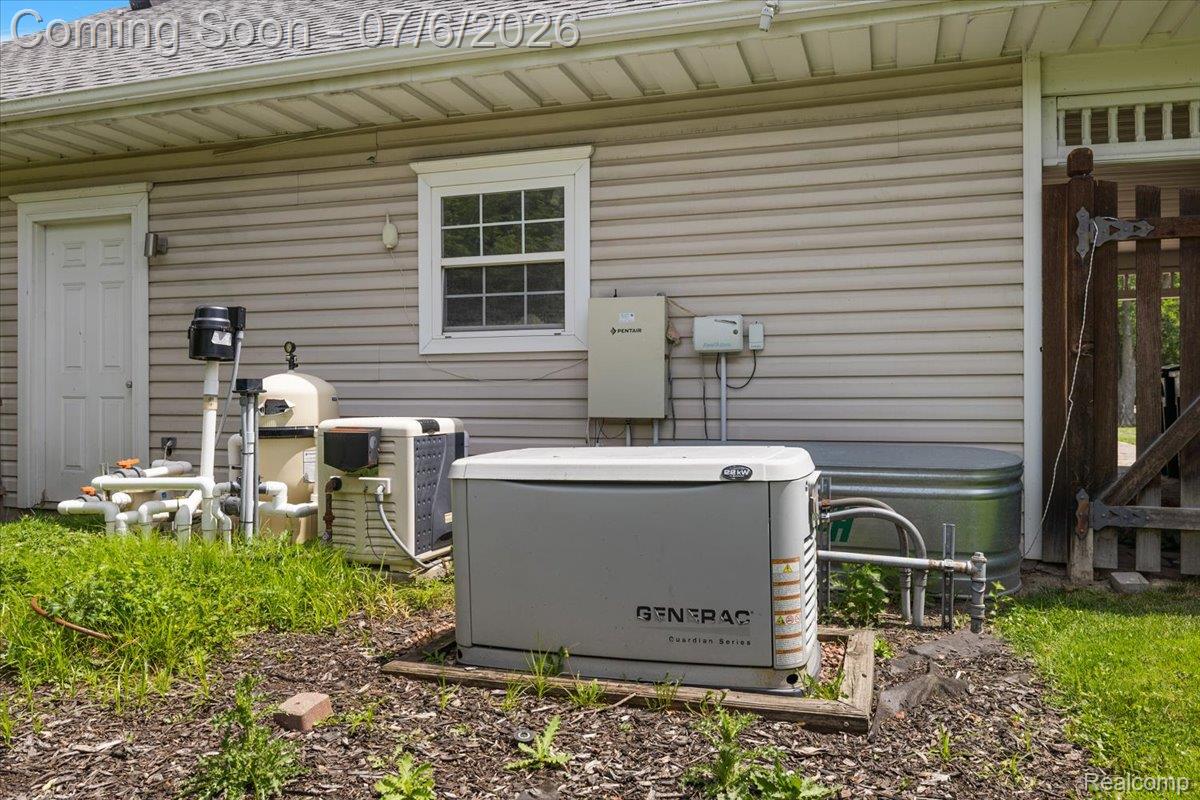 1051 Devonshire Road Grosse Pointe, MI 48230 - Photo 88 of 98 Exterior features Generac generator, central air conditioning unit, and pool equipment