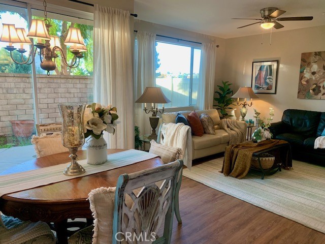 39213 Anchor Bay, Unit B Murrieta, CA 92563 - Photo 13 of 48 a living room with furniture and a table