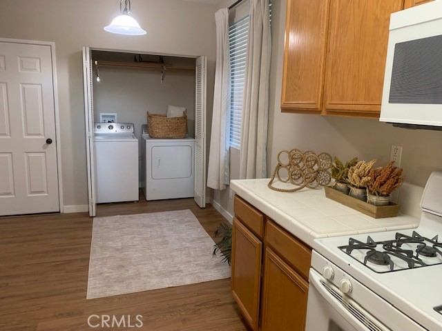 39213 Anchor Bay, Unit B Murrieta, CA 92563 - Photo 15 of 48 a kitchen with a sink and cabinets