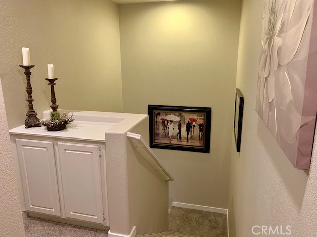 39213 Anchor Bay, Unit B Murrieta, CA 92563 - Photo 21 of 48 a view of a hallway with storage