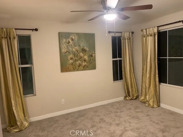 a bathroom with a sink double vanity and a mirror