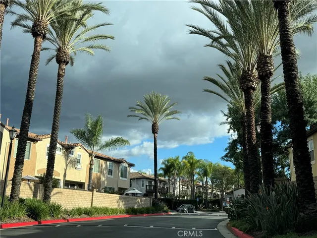 a view of a swimming pool with outdoor seating