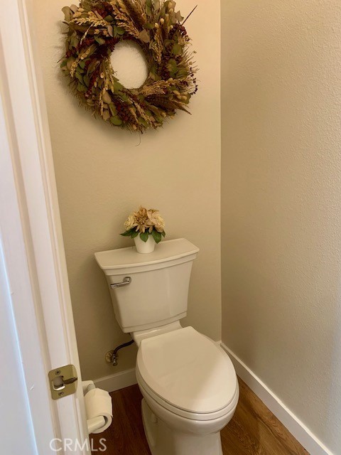 39213 Anchor Bay, Unit B Murrieta, CA 92563 - Photo 34 of 48 a bathroom with a toilet and a sink