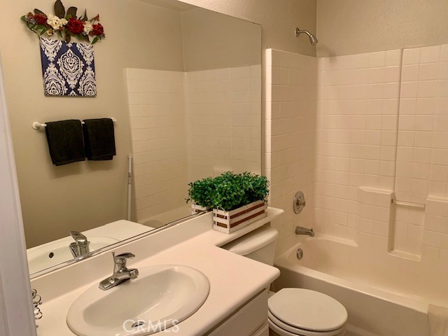 39213 Anchor Bay, Unit B Murrieta, CA 92563 - Photo 37 of 48 a bathroom with a sink toilet and shower