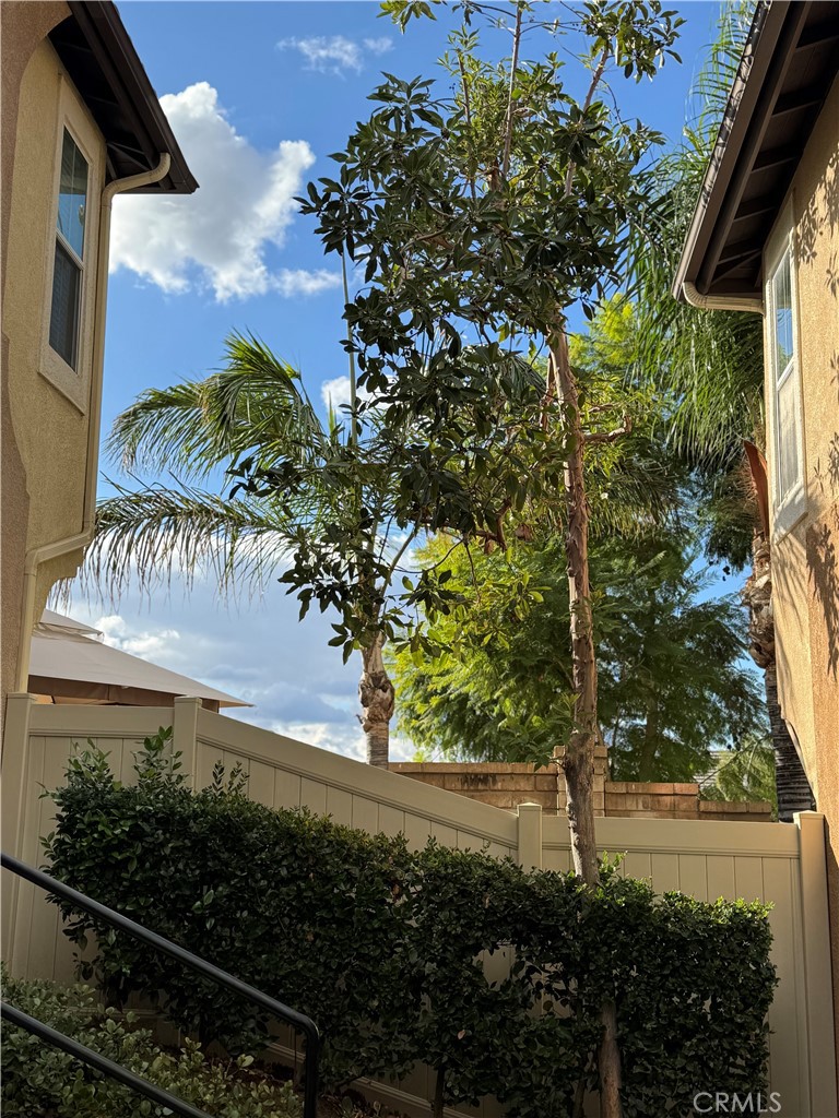 39213 Anchor Bay, Unit B Murrieta, CA 92563 - Photo 40 of 48 a view of a yard in front of a house with a yard