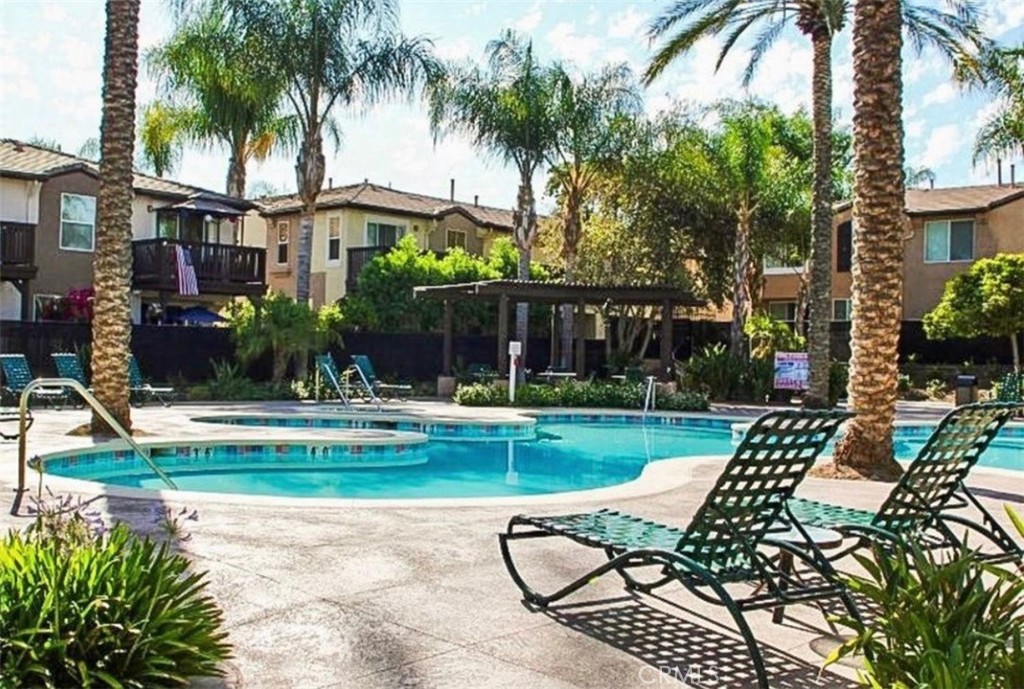 39213 Anchor Bay, Unit B Murrieta, CA 92563 - Photo 45 of 48 a view of outdoor space yard deck patio and swimming pool