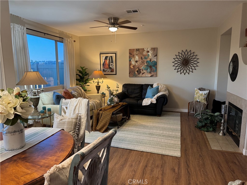 39213 Anchor Bay, Unit B Murrieta, CA 92563 - Photo 6 of 48 a living room with furniture fireplace and wooden floor