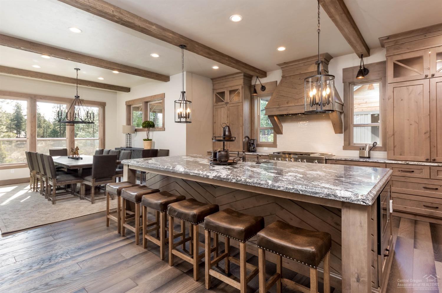 56424 Fireglass Loop Bend, OR 97707 - Photo 6 of 25 Of all the rooms in a home, the dining room often feels the most special. While a lot of us may not use it every day, it?s where we gather to mark happy occasions and to entertain close friends.