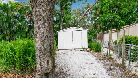 a backyard of a house with lots of green space