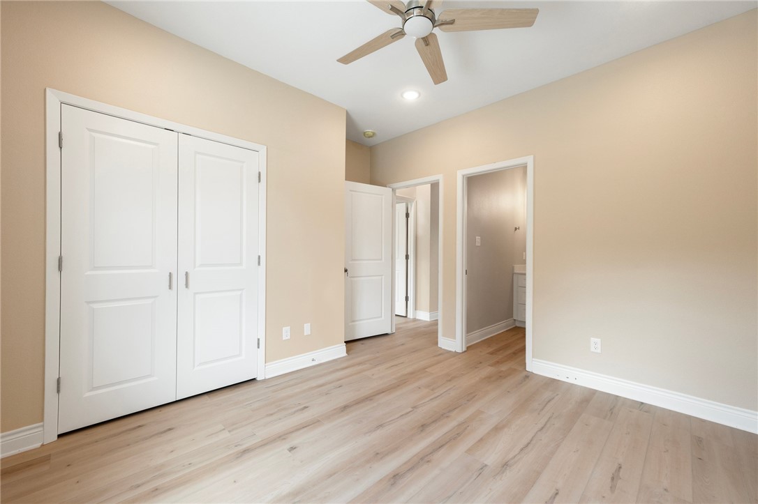 3213 Link Street, Unit 116 Bryan, TX 77801 - Photo 17 of 27 a view of empty room with wooden floor