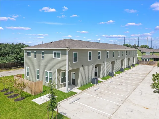 an aerial view of house with yard swimming pool and mountain view