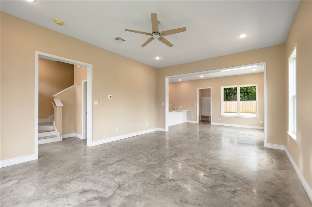 3213 Link Street, Unit 116 Bryan, TX 77801 - Photo 3 of 27 a view of a livingroom with a ceiling fan and window