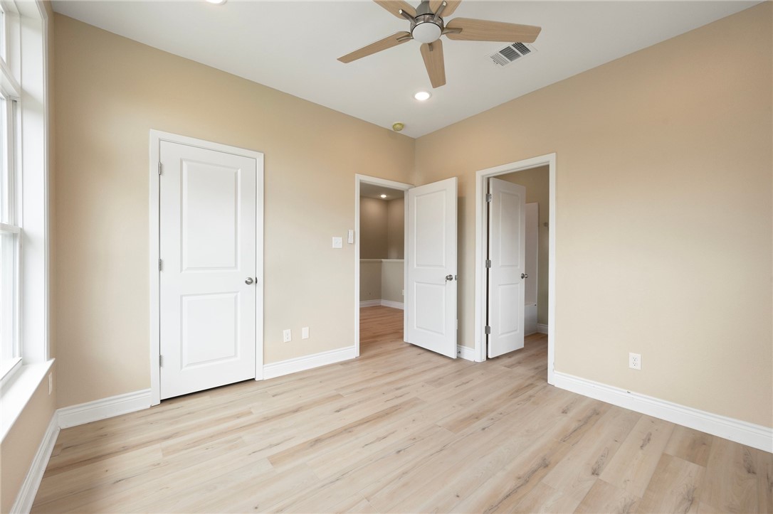 3213 Link Street, Unit 116 Bryan, TX 77801 - Photo 10 of 27 wooden floor in an empty room
