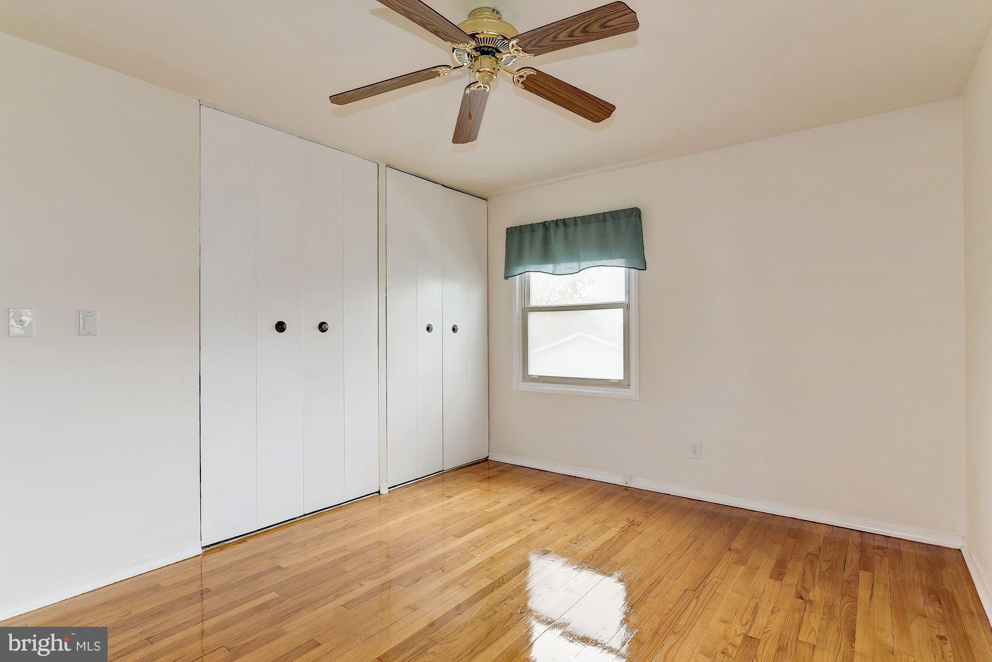 1909 Hanson Road Edgewood, MD 21040 - Photo 14 of 29 a view of empty room with wooden floor and fan