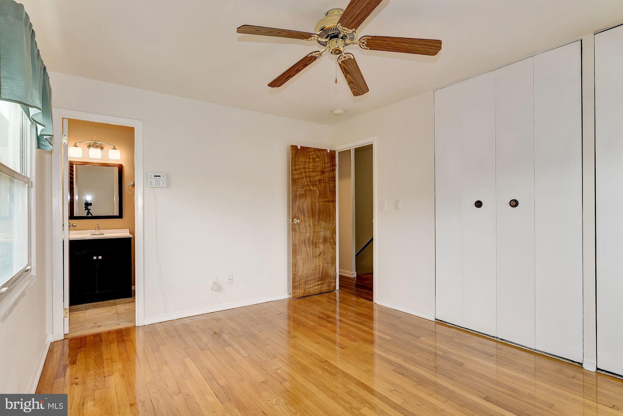 1909 Hanson Road Edgewood, MD 21040 - Photo 16 of 29 wooden floor in an empty room with a window