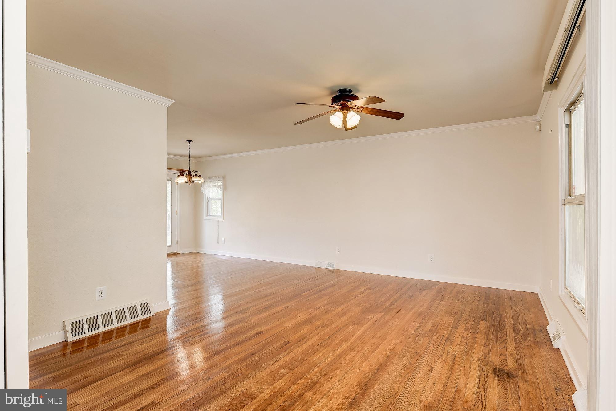 1909 Hanson Road Edgewood, MD 21040 - Photo 3 of 29 a view of empty room with wooden floor