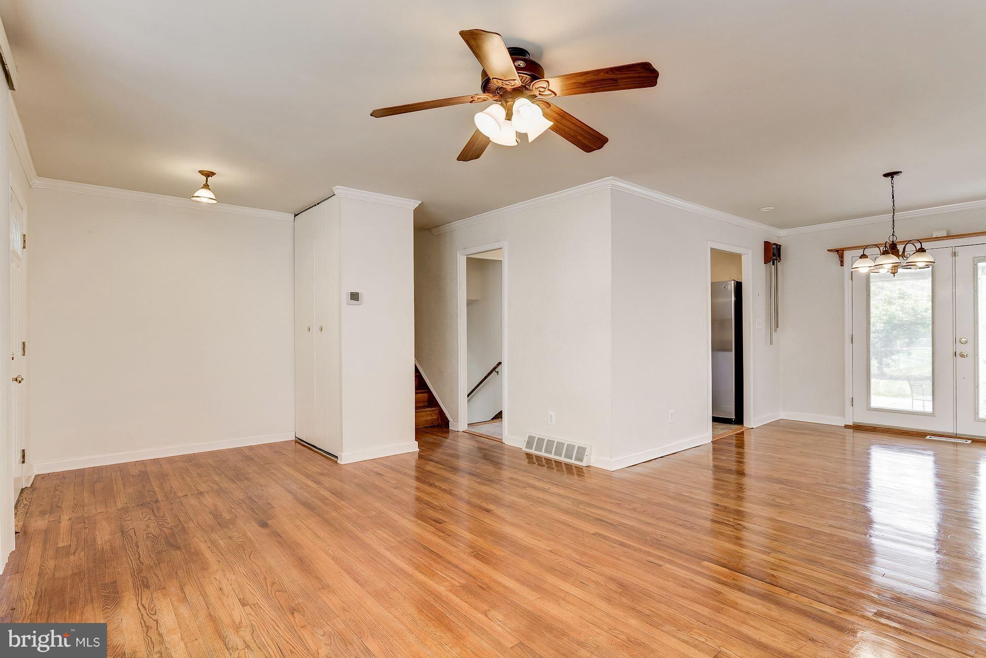 1909 Hanson Road Edgewood, MD 21040 - Photo 4 of 29 a view of empty room with wooden floor and fan