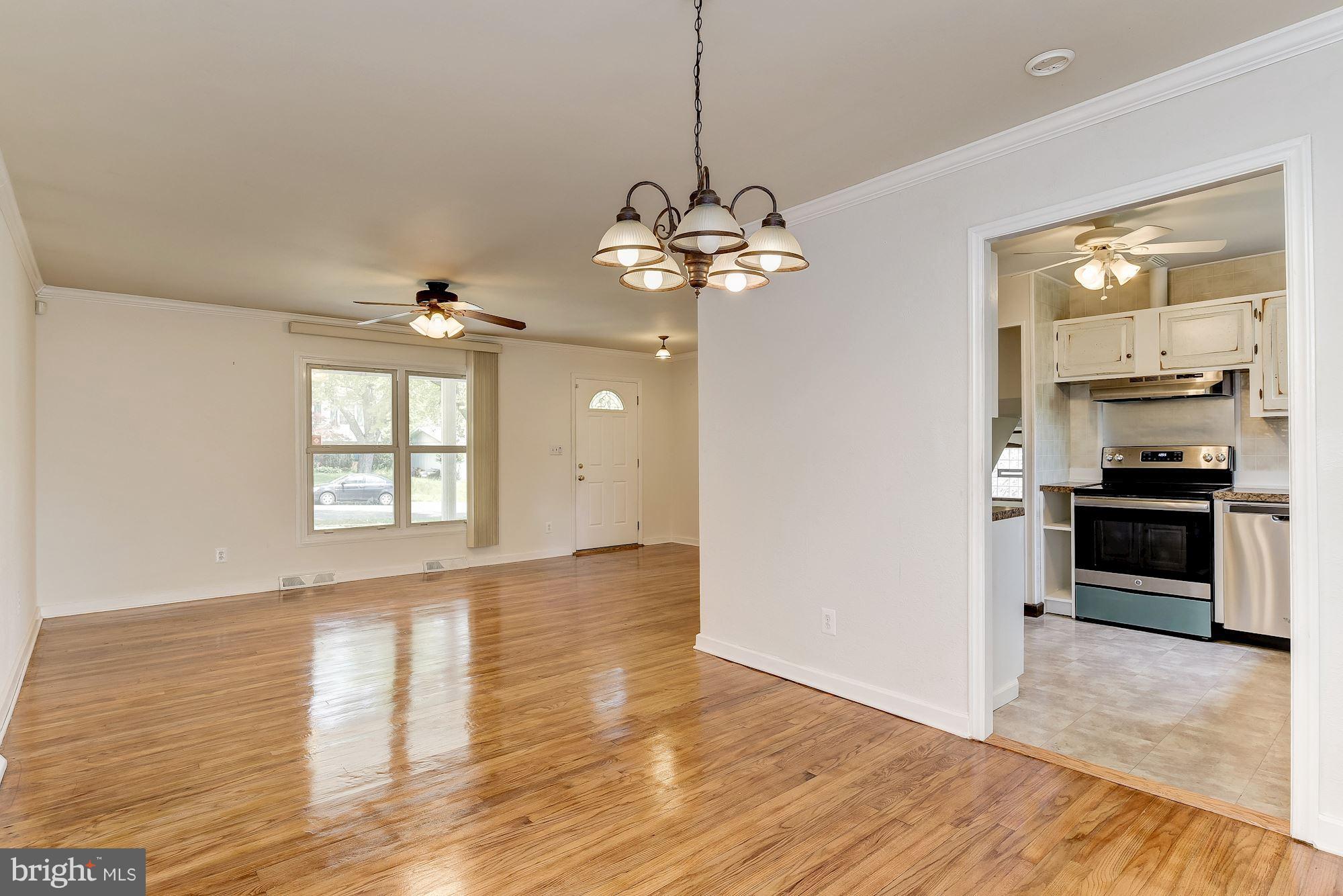 1909 Hanson Road Edgewood, MD 21040 - Photo 9 of 29 a view of a kitchen with a stove cabinets and wooden floor