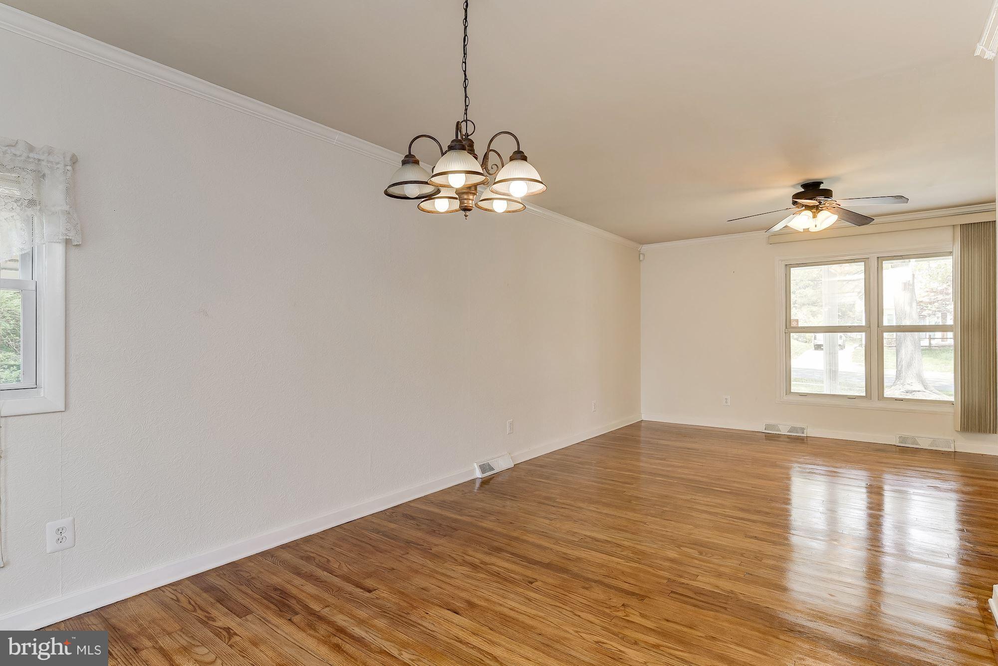 1909 Hanson Road Edgewood, MD 21040 - Photo 10 of 29 a view of a room with a large window and wooden floor