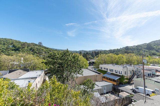 a view of outdoor space with wooden floor and deck