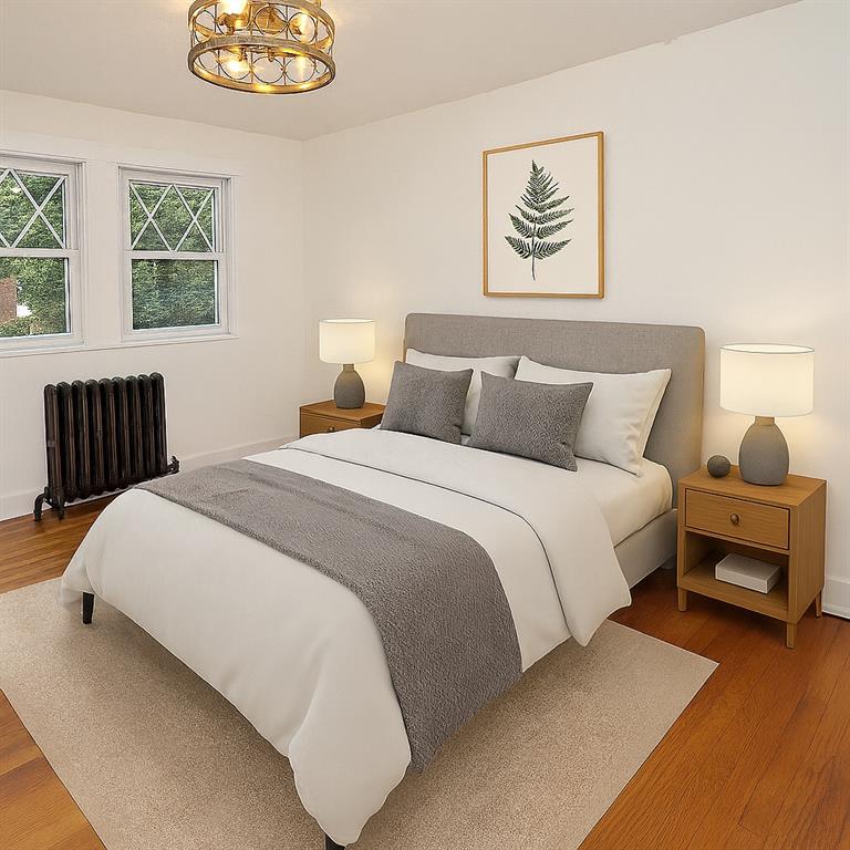 1423 Chislett Street Pittsburgh, PA 15206 - Photo 20 of 47 a bedroom with bed and a window
