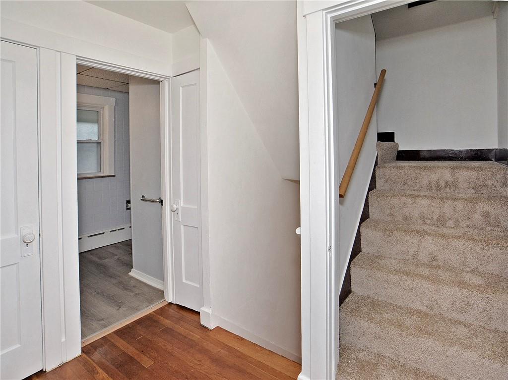 1423 Chislett Street Pittsburgh, PA 15206 - Photo 21 of 47 a view of a hallway with wooden floor and entryway