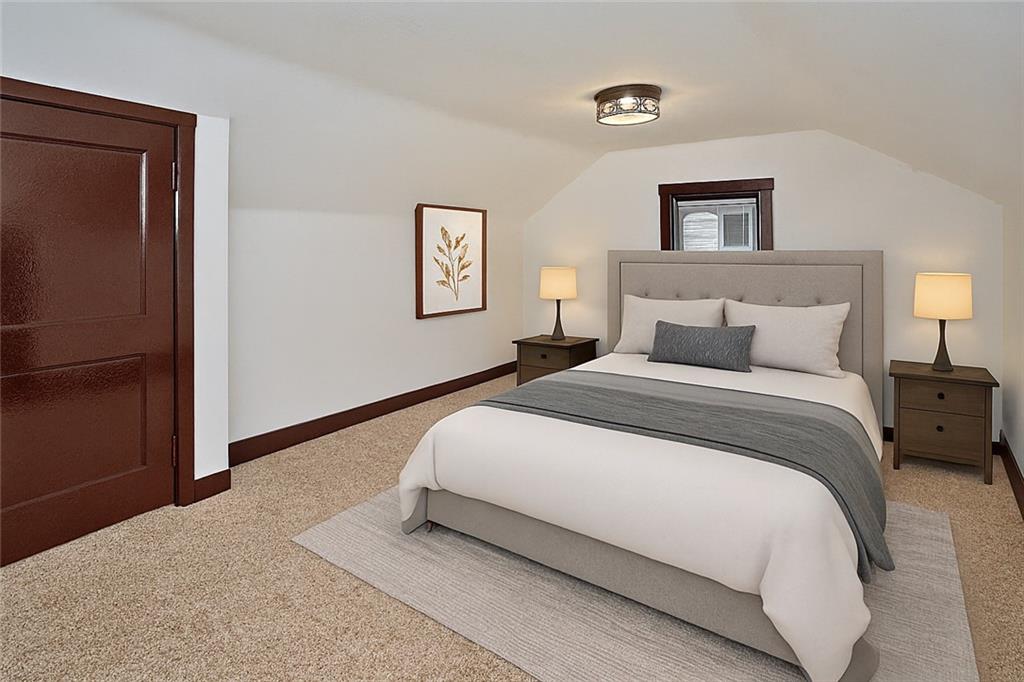 1423 Chislett Street Pittsburgh, PA 15206 - Photo 23 of 47 a bedroom with a bed and a painting