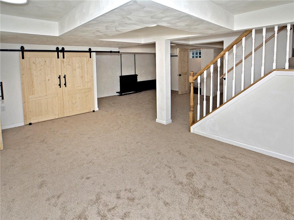 1423 Chislett Street Pittsburgh, PA 15206 - Photo 27 of 47 a view of an empty room with stairs