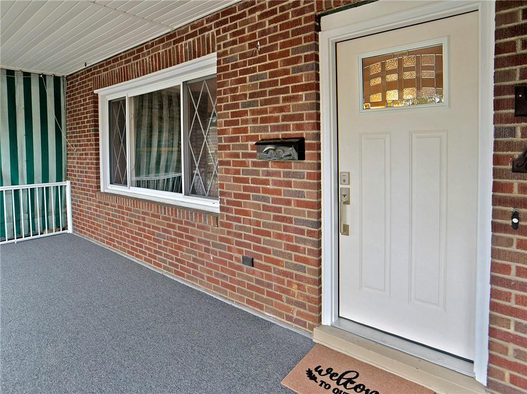 1423 Chislett Street Pittsburgh, PA 15206 - Photo 3 of 47 a view of a brick house with front door