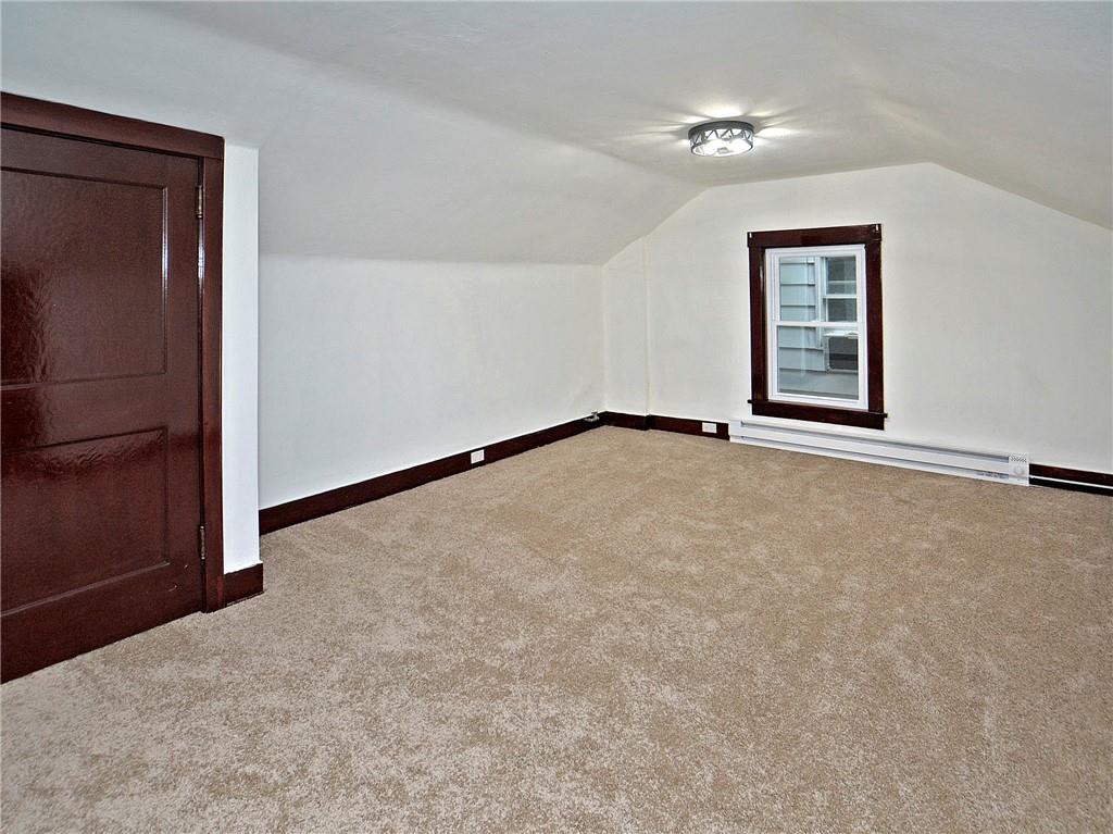 1423 Chislett Street Pittsburgh, PA 15206 - Photo 39 of 47 an empty room with windows and closet