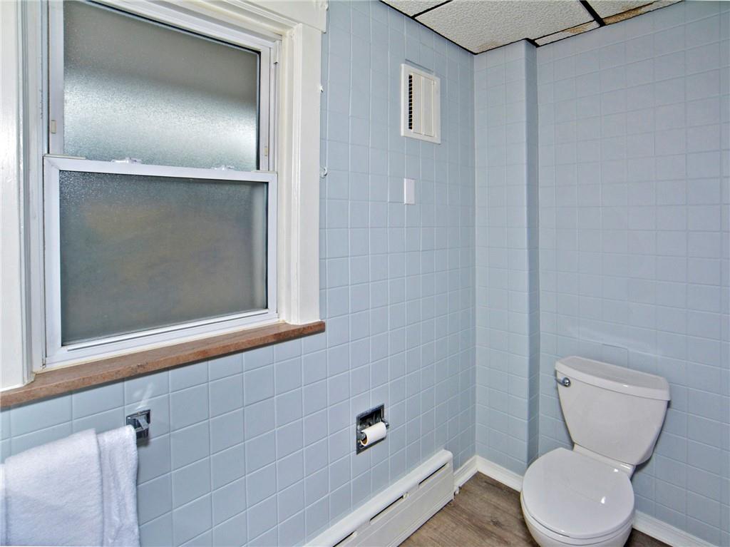 1423 Chislett Street Pittsburgh, PA 15206 - Photo 41 of 47 a bathroom with a toilet