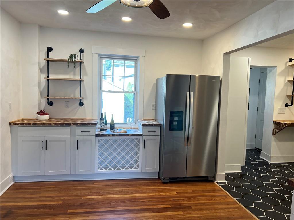 1423 Chislett Street Pittsburgh, PA 15206 - Photo 5 of 47 a view of a kitchen with granite countertop a refrigerator and a sink