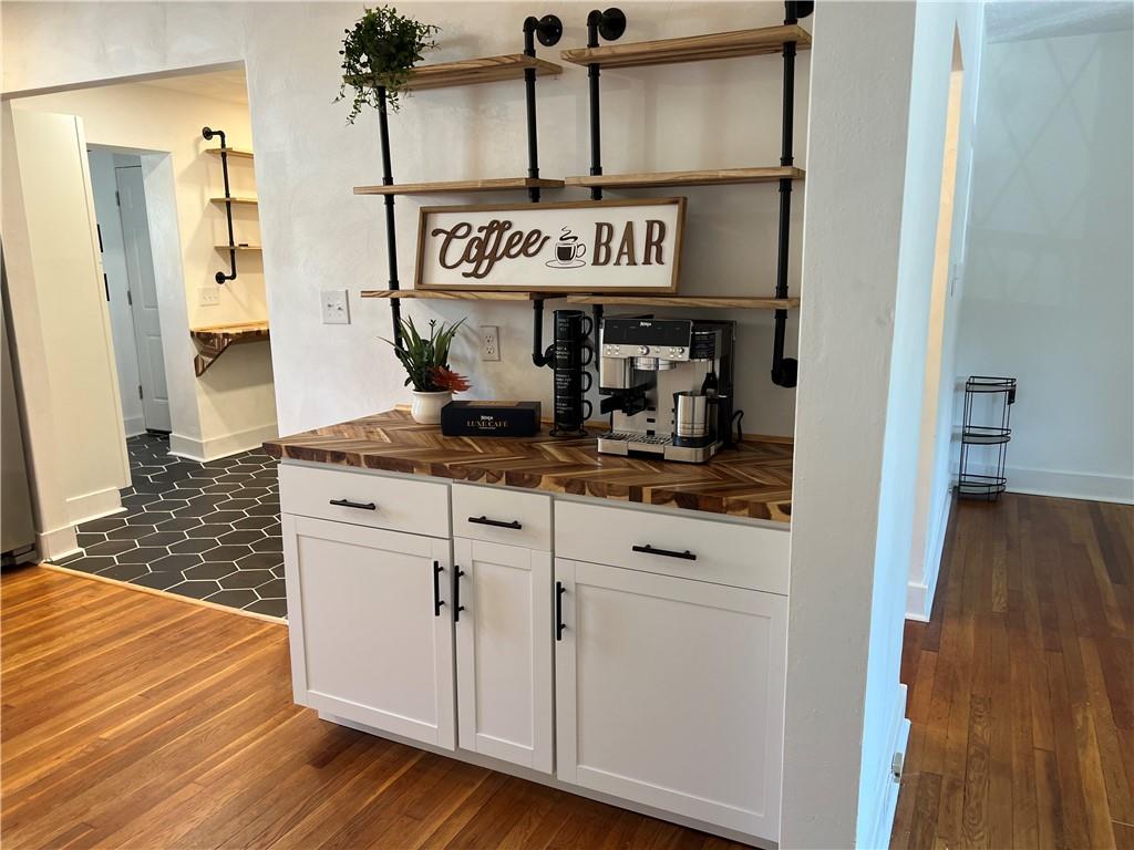 1423 Chislett Street Pittsburgh, PA 15206 - Photo 10 of 47 a kitchen with stainless steel appliances granite countertop a refrigerator and stove