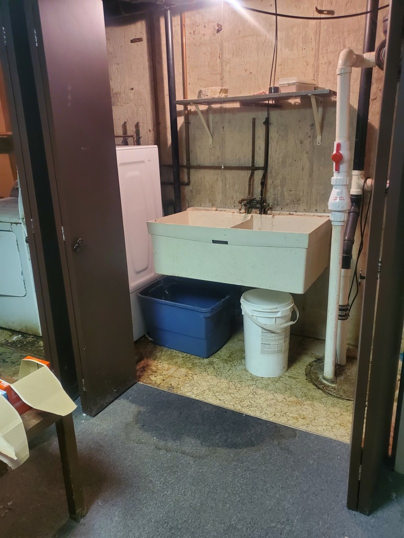 20525 Ridgeview Drive Marengo, IL 60152 - Photo 16 of 20 a bathroom with a sink and mirror