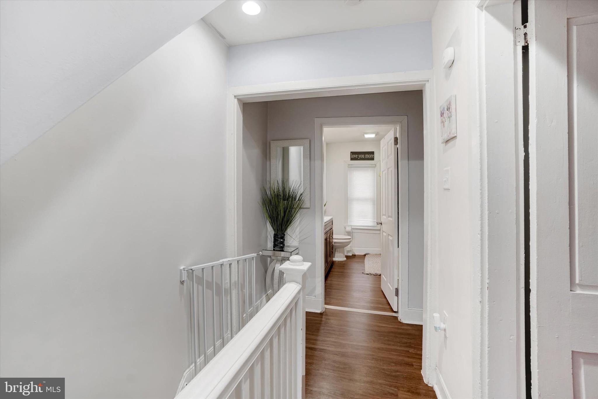 442 South Duke Street York, PA 17401 - Photo 15 of 24 a view of a hallway with wooden floor and staircase